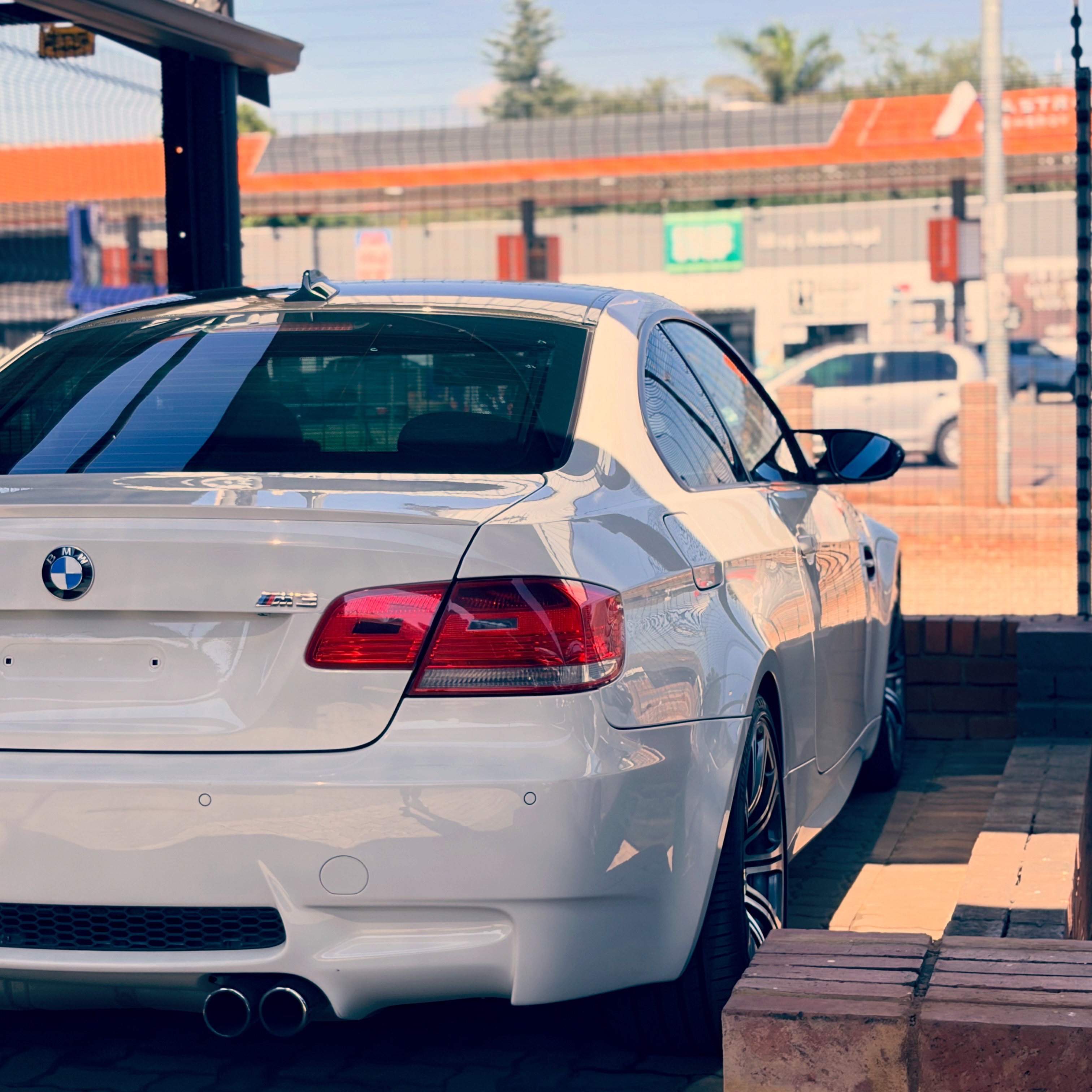 BMW M3 photographed on-site at a dealership