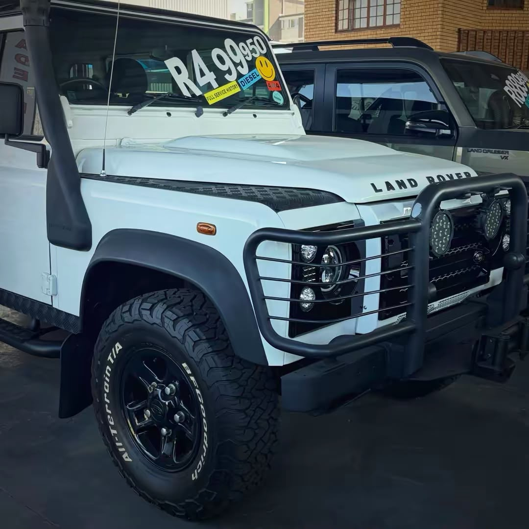 Land Rover Defender photographed on a dealership lot